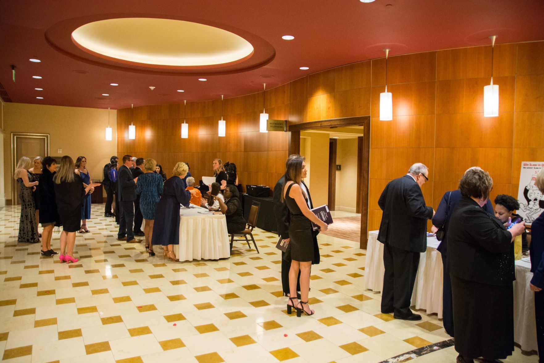 Guests check in to the event